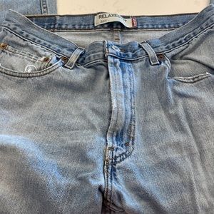 Levi s jeans lighter wash hole in right leg see pics